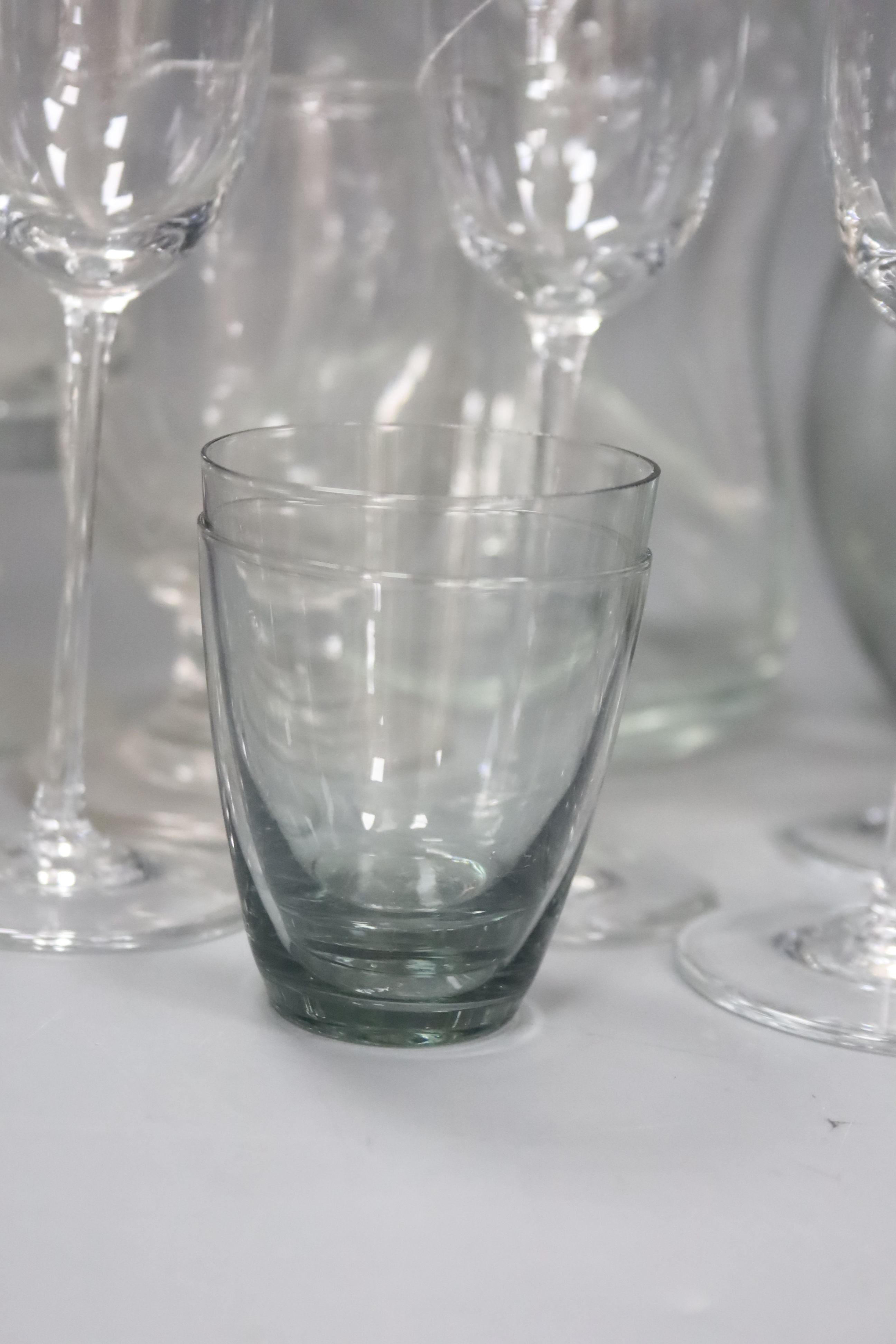 A Swedish glass decanter and glasses, four assorted etched rummers, nine Hadeland Norwegian glasses